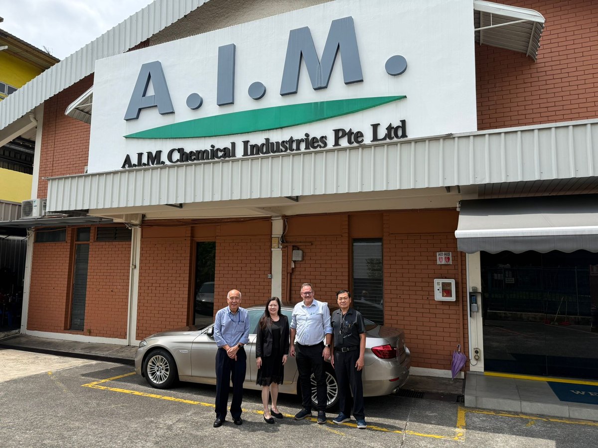 Raymond, Chang, Felice Lim and Mike Pui outside AIM chemicals facility
